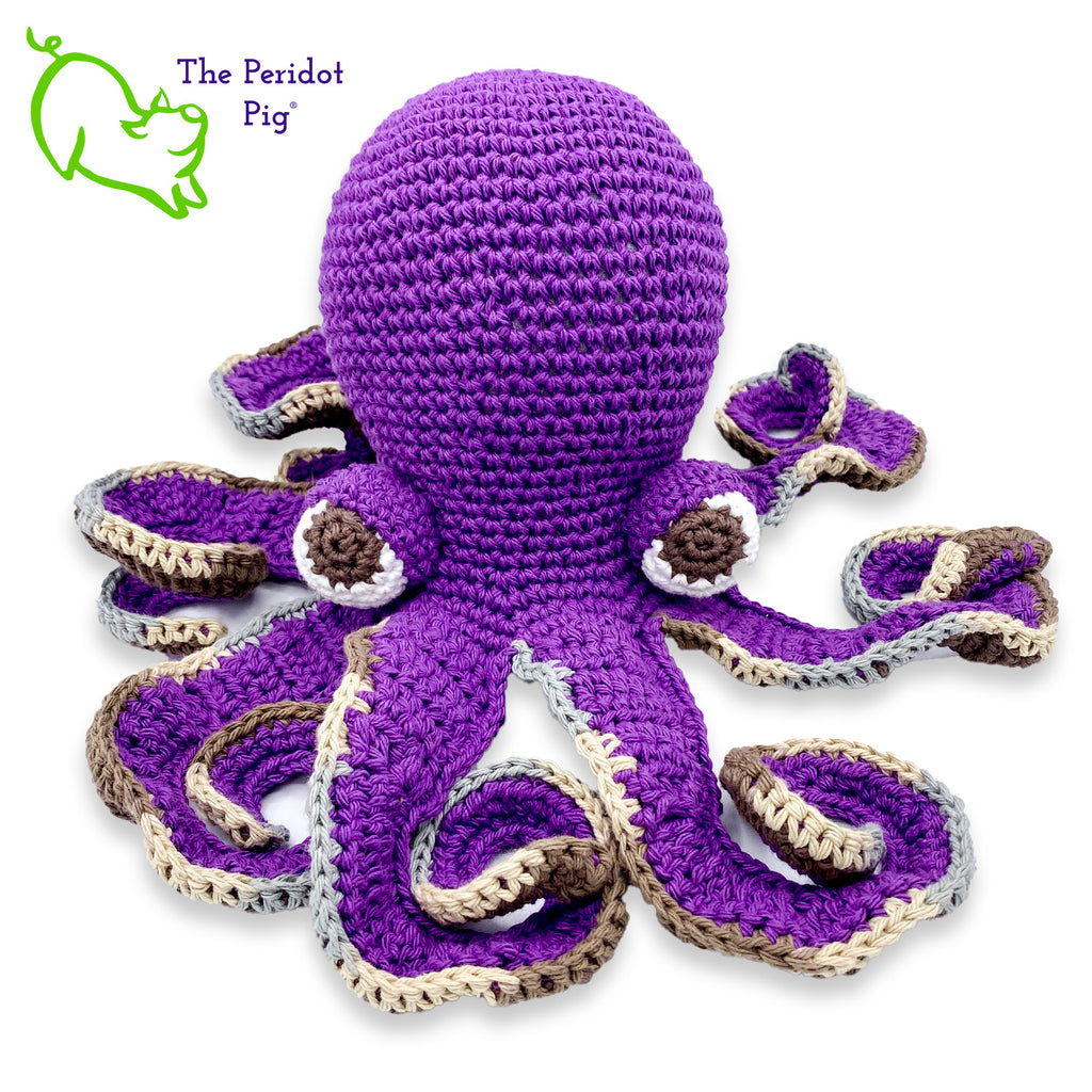 My husband thought an octopus only comes in black but we begged to differ! The North Pacific Giant Octopus is a lovely shade of orange like our Olivia. At first glance, she's a bit intimidating but in reality, she is soft and cuddly. Olivia is made from sturdy cotton and is meant to last a life-time. Also available in a purple too! Front view shown in purple.