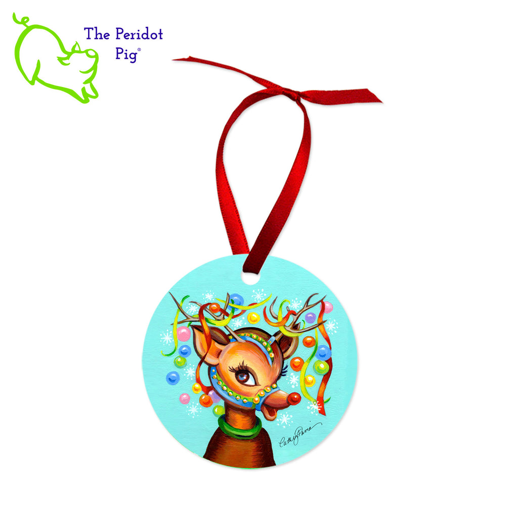 This ornament features the colorful artwork of Cathy Pavia. On the front, you have a choice of five different holiday images. On the back, the ornament says "Happy Holidays" or "Merry Christmas" in bright colors. Front view of the Rudolf style shown.