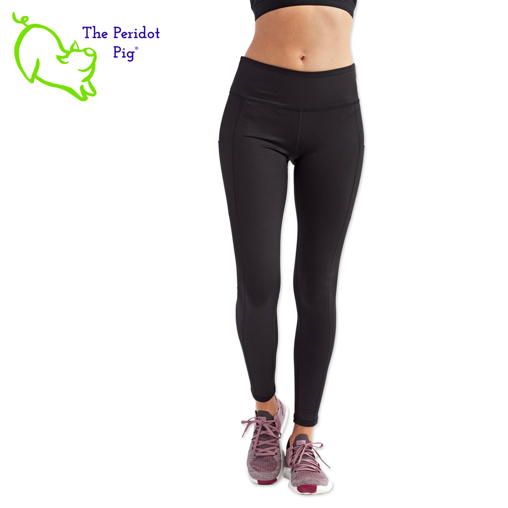 Luxuriate in luxury with the PureBliss Studios Lotus High Rise Capri Legging—super comfortable and breathable with two side pockets, an interior pocket, plus the brand logo on the back right leg in a matte vinyl and a dazzling color lotus on the back. And who wouldn't love a little "love" on the left pocket? Stretchy yet snug-fitting, enjoy the perfect yoga session! Front view shown.
