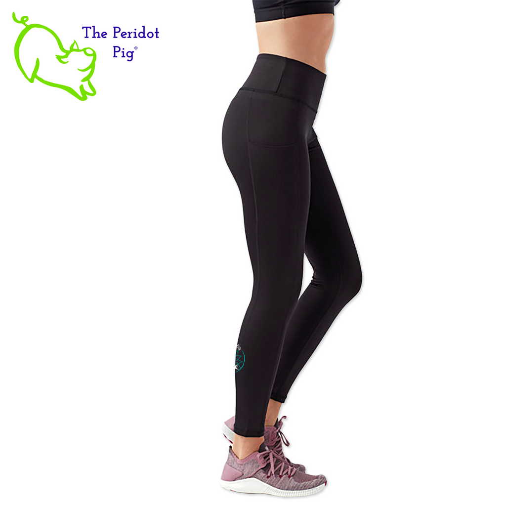 Luxuriate in luxury with the PureBliss Studios Lotus High Rise Capri Legging—super comfortable and breathable with two side pockets, an interior pocket, plus the brand logo on the back right leg in a matte vinyl and a dazzling color lotus on the back. And who wouldn't love a little "love" on the left pocket? Stretchy yet snug-fitting, enjoy the perfect yoga session! Right side view shown.