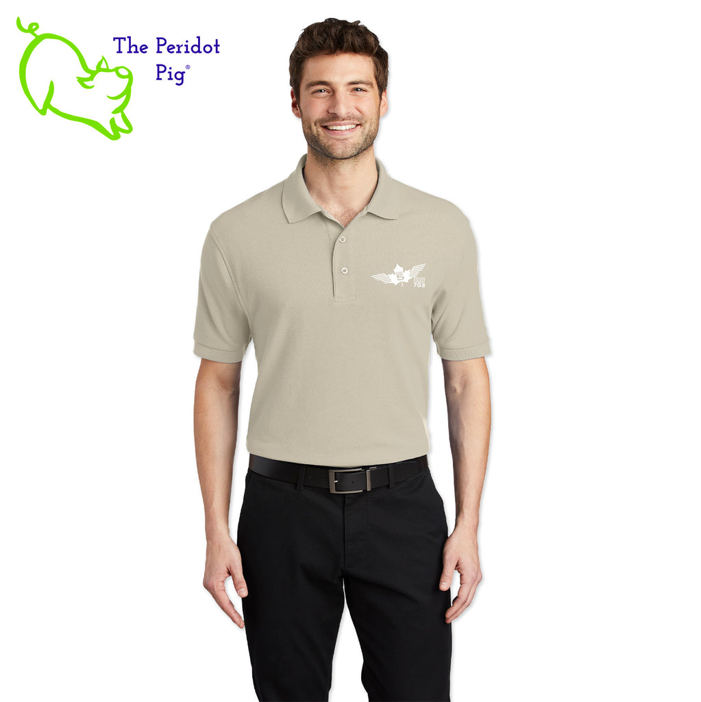 Renowned for its resilience, our incomparably comfortable classic polo is second to none. Expertly designed to resist wrinkles and shrinkage, this must-have polo delivers a luxuriously soft feel. Featuring the iconic EAA Chapter 5 logo on the left chest, you won't ever regret choosing this timeless piece. Front view shown in Stone-White.