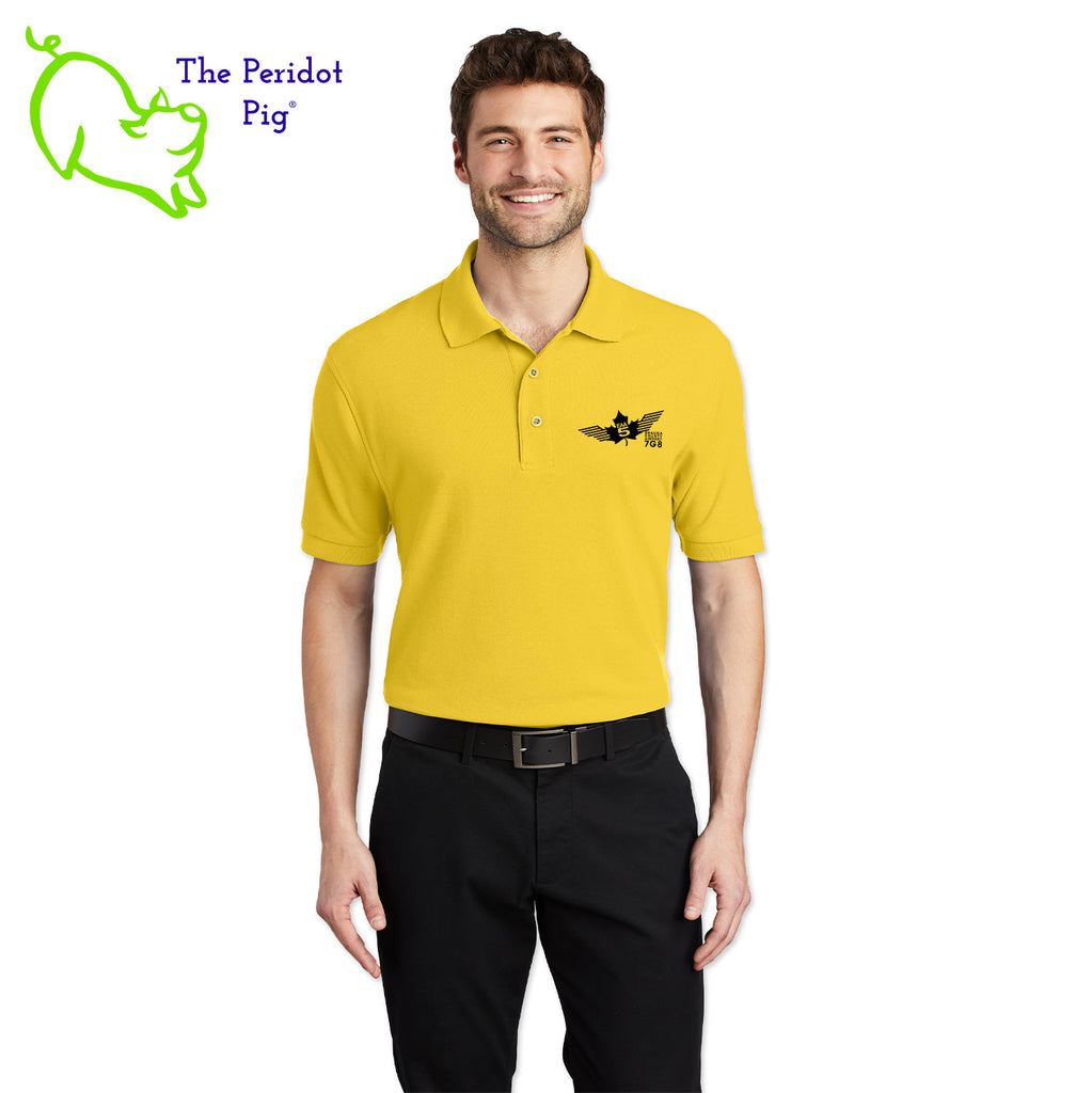 Renowned for its resilience, our incomparably comfortable classic polo is second to none. Expertly designed to resist wrinkles and shrinkage, this must-have polo delivers a luxuriously soft feel. Featuring the iconic EAA Chapter 5 logo on the left chest, you won't ever regret choosing this timeless piece. Front view shown in Yellow-Black.
