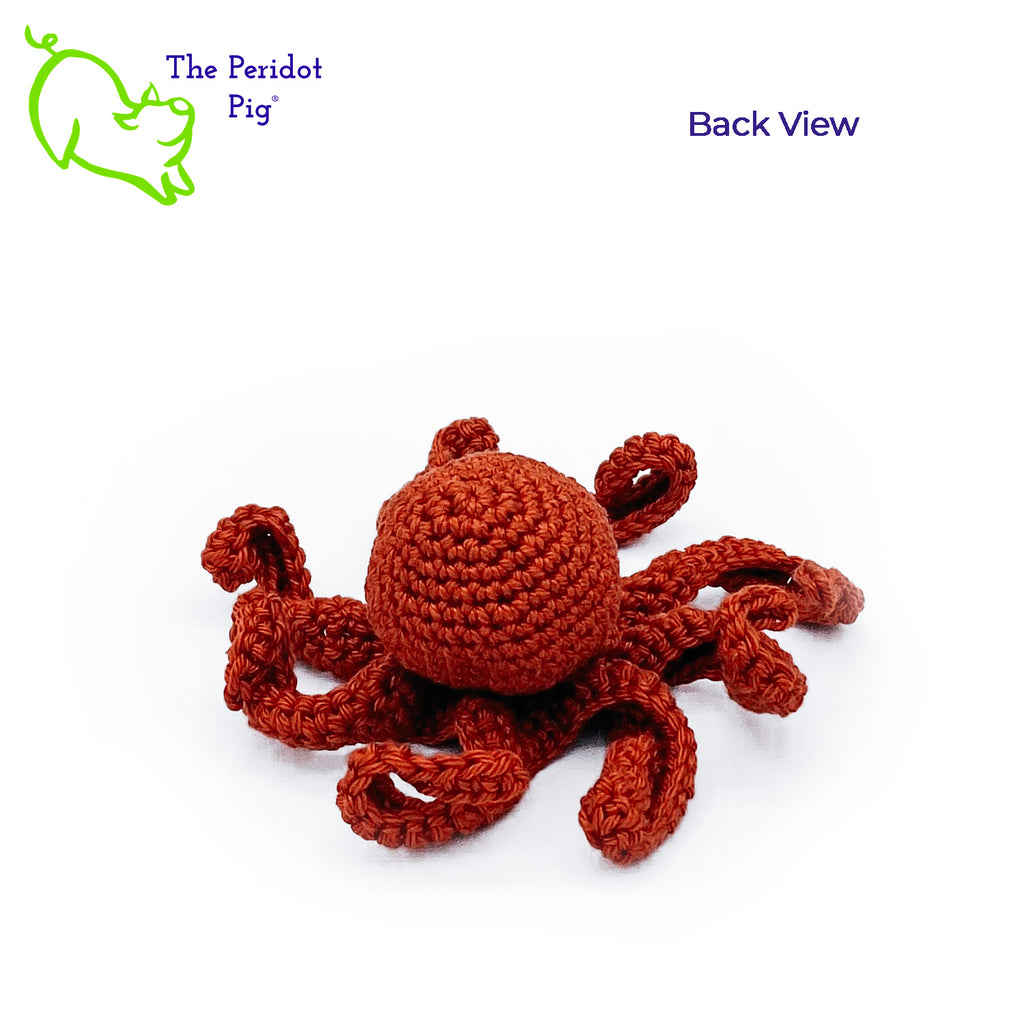 Leggy is made from sturdy cotton and is meant to last a life-time.  The safety eyes are securely attached, but for children under 3 please use with supervision. Back view shown in orange.