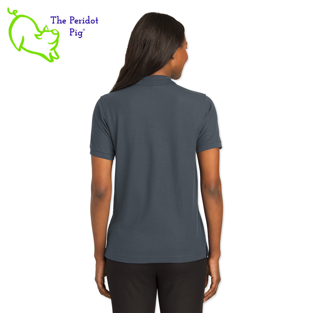 Renowned for its resilience, our incomparably comfortable classic polo is second to none. Expertly designed to resist wrinkles and shrinkage, this must-have polo delivers a luxuriously soft feel. Featuring the iconic EAA Chapter 5 logo on the left chest, you won't ever regret choosing this timeless piece. Back view shown in Charcoal.