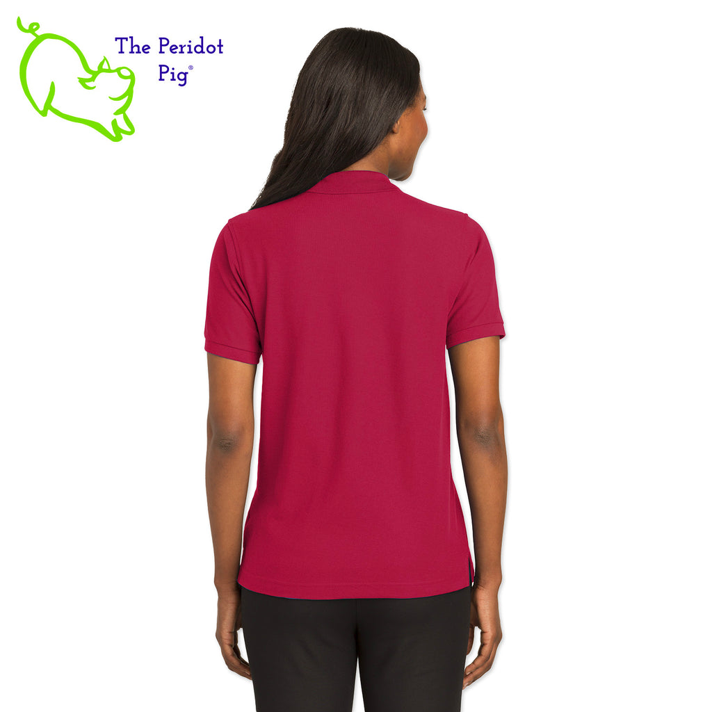 Renowned for its resilience, our incomparably comfortable classic polo is second to none. Expertly designed to resist wrinkles and shrinkage, this must-have polo delivers a luxuriously soft feel. Featuring the iconic EAA Chapter 5 logo on the left chest, you won't ever regret choosing this timeless piece. Back view shown in Red.