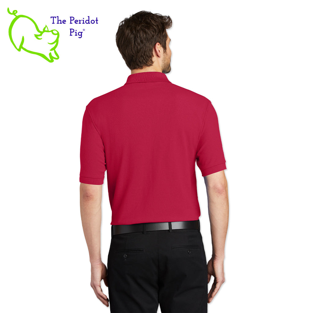 Renowned for its resilience, our incomparably comfortable classic polo is second to none. Expertly designed to resist wrinkles and shrinkage, this must-have polo delivers a luxuriously soft feel. Featuring the iconic EAA Chapter 5 logo on the left chest, you won't ever regret choosing this timeless piece. Back view shown in Red.