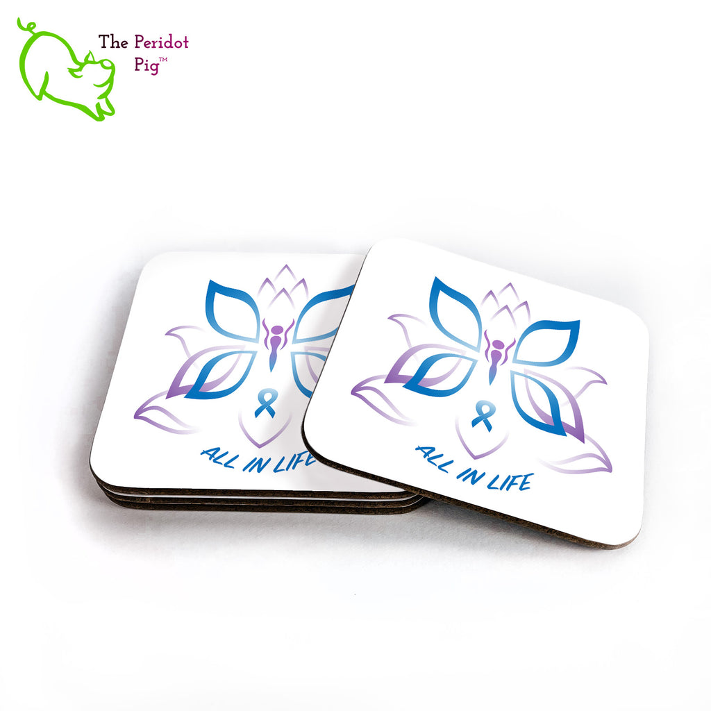 This set of four square hardboard coasters is printed with Kristin Zako's All in Life logo. Each coaster is individually printed with a bright glossy white finish. Shown in a stack of four.