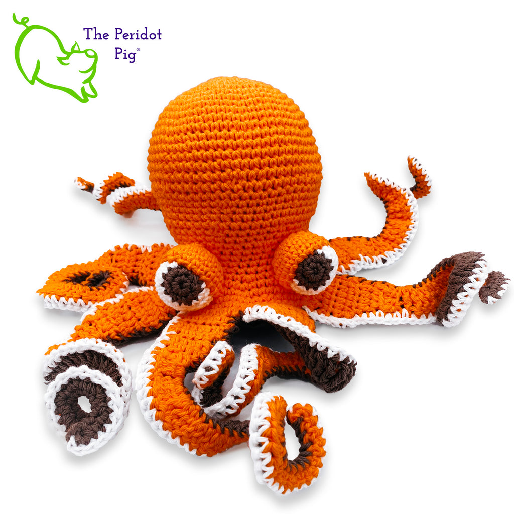 My husband thought an octopus only comes in black but we begged to differ! The North Pacific Giant Octopus come is a lovely shade of orange like our Olivia. At first glance, she's a bit intimidating but in reality, she is soft and cuddly. Olivia is made from sturdy cotton and is meant to last a life-time. Front view shown.