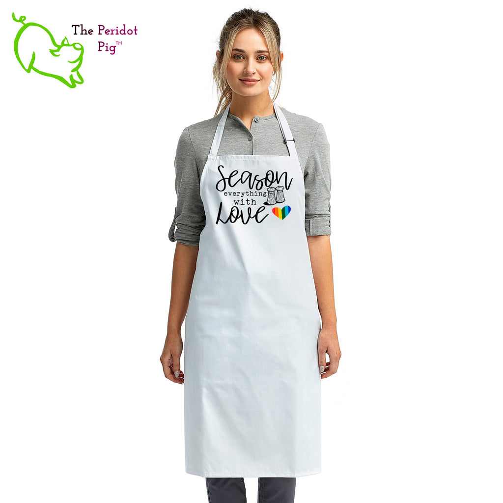 This lovely apron has a printed graphic that states "Season everything with love" on the front with a little rainbow heart. Perfect gift during Pride month or any day for that matter! Front view shown in White.