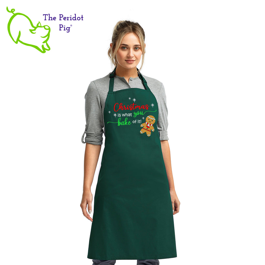 Looking for a special gift for the baker in your life? Here's a fun Christmas treat for them! The front says, "Christmas is what you bake of it" in bright festive colors. There are sparkly silver stars and a cute ginger bread man.  Front view shown in green.