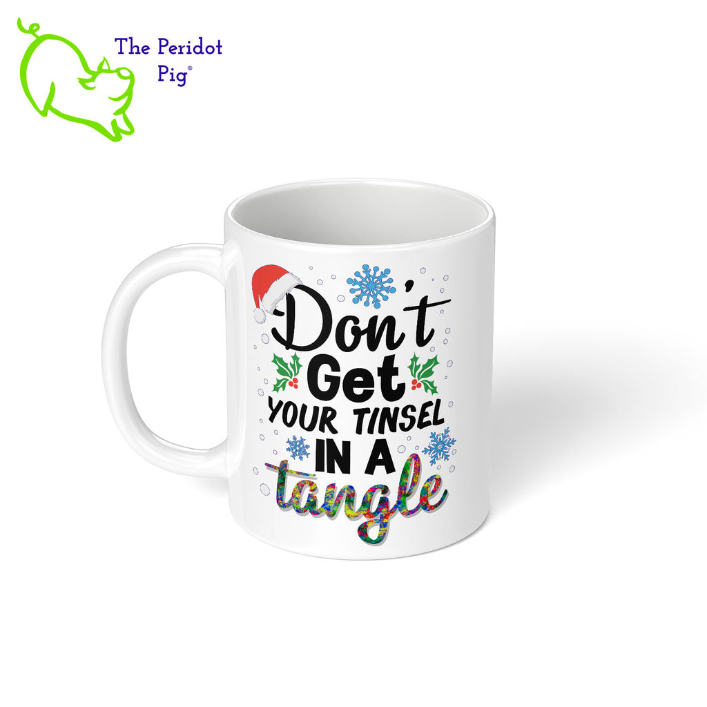The holidays can be stressful. Tell them all to chill with your special mug. This one is printed on the front and back with vivid permanent colors. It says, "Don't get your tinsel in a tangle". Left view shown.