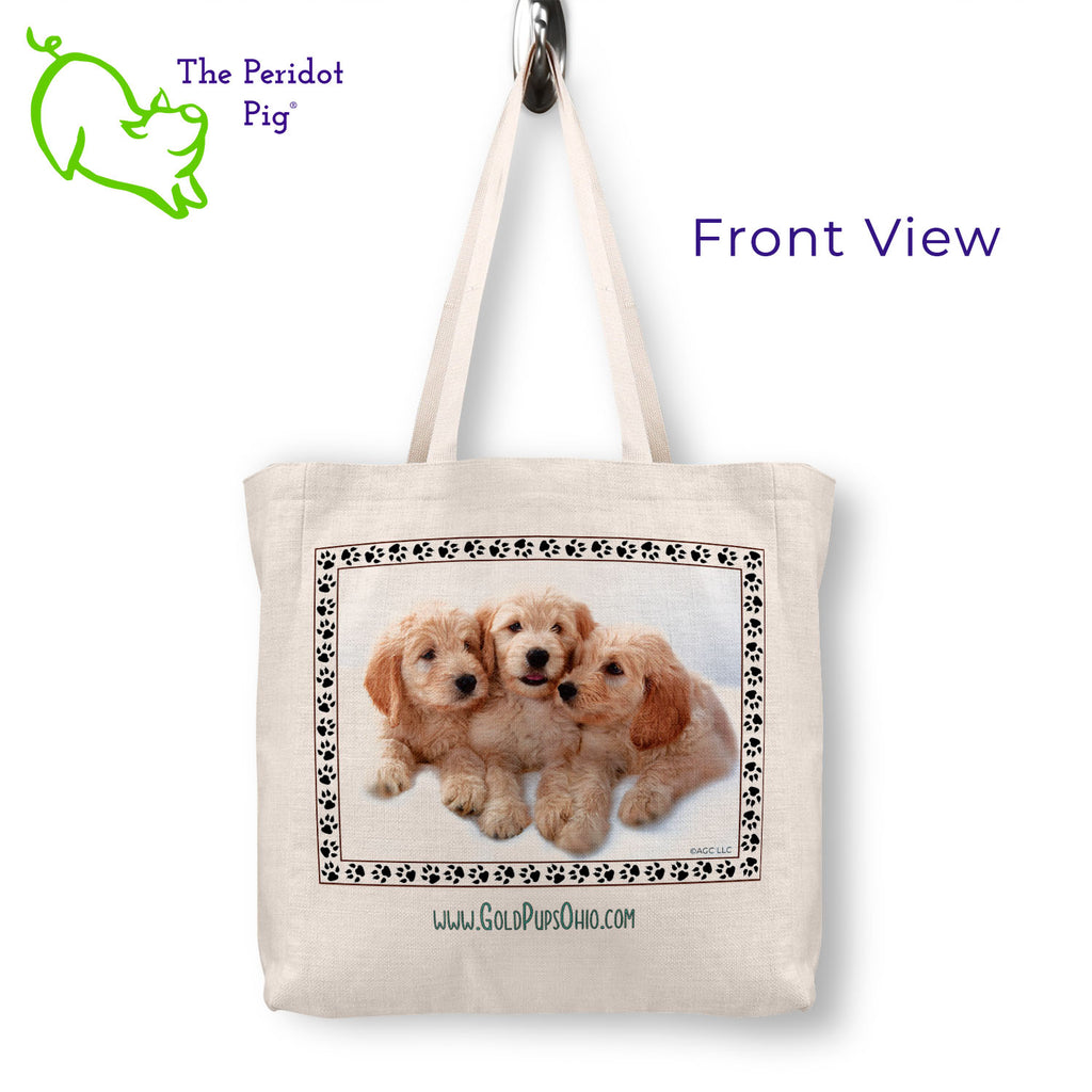 A spacious and trendy tote bag to help you carry around everything while showing off your adorable new puppy. These totes are very sturdy and feature a sublimated print that won't fade or peel over time. Printed in vibrant color with Gold Pups Ohio logo on the front side. The back side is blank. Front view shown.
