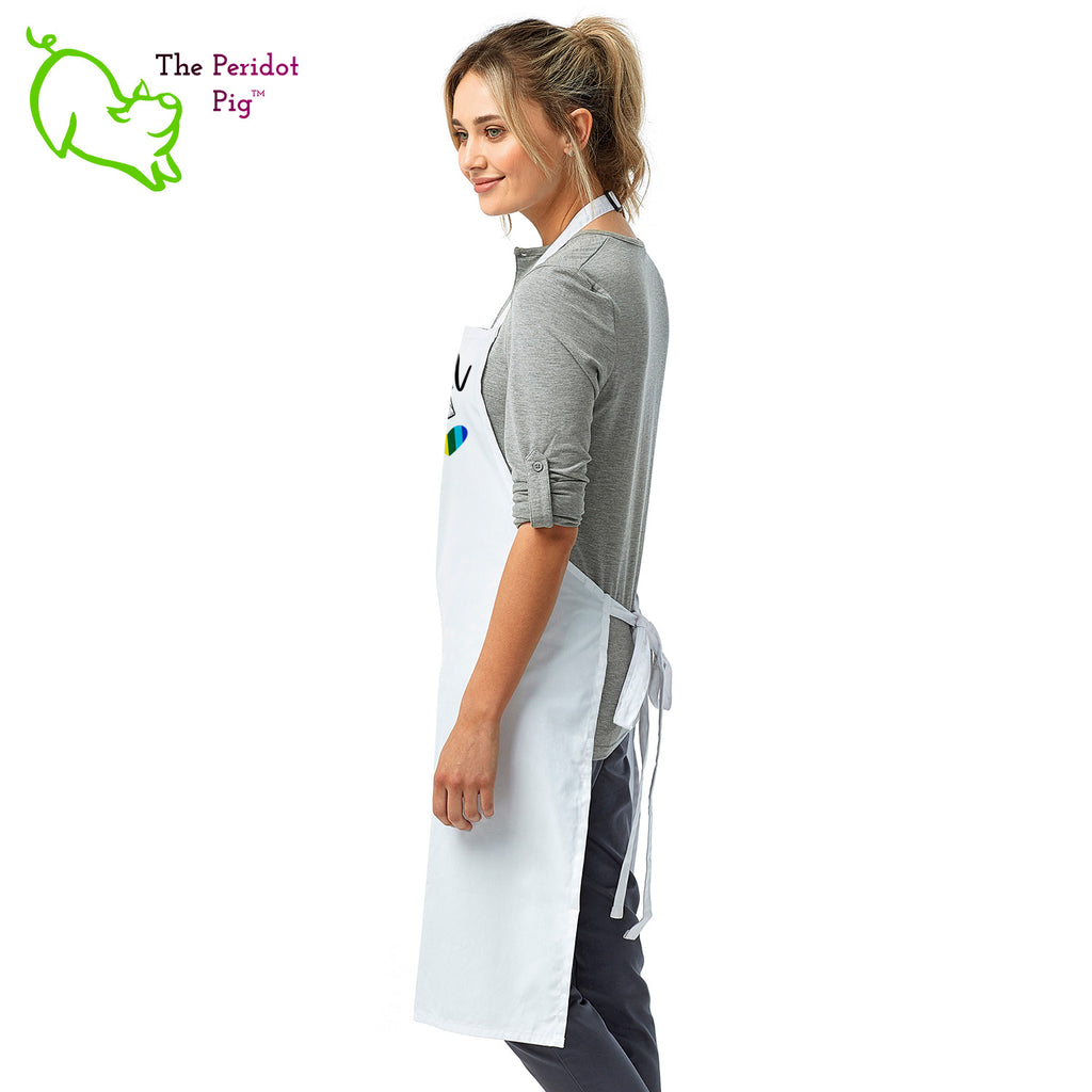 This lovely apron has a printed graphic that states "Season everything with love" on the front with a little rainbow heart. Perfect gift during Pride month or any day for that matter! Side view shown in White.