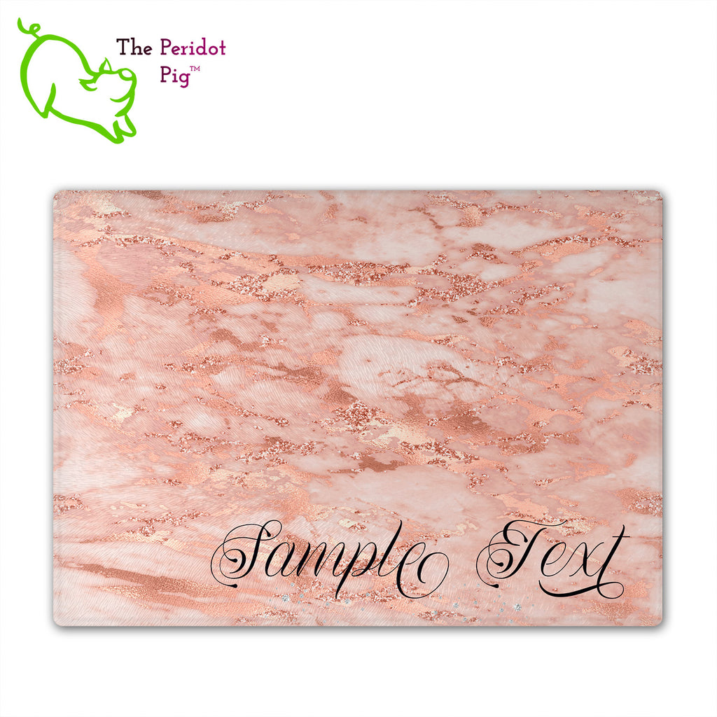 These beautiful tempered glass cutting boards are a wonderful keepsake!  They can be personalized with names, quotes or dates. These feature swirling marbles in rose gold and glitter foil in a vivid and detailed print. We prefer a scrolling script for the personalization in this design. There is also a little bling under the name included too. Front view with sample text and no highlights. Style A