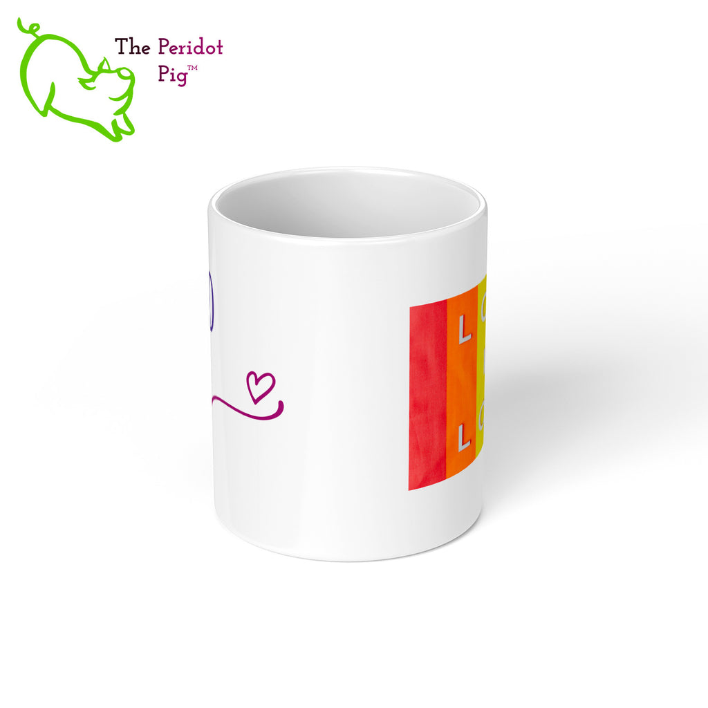 Celebrate Father's day with a gift that embraces your pride. The mug says, "Proud Dad" on the front. On the back, it has rainbow stripes with the saying, "Love is love". Center view.