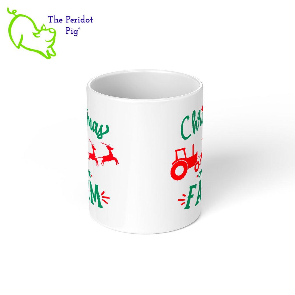 We live in Ohio and still regularly see tractors heading down the road from field to field.  When we saw this mug design, we had to have it! It would make the perfect gift for the farmer, gardener or rural friend. The design is printed in vivid, permanent color on both the front and back of the mug.  It's says, "Christmas on the Farm" with a little tractor being pulled by flying reindeer! Center view shown.