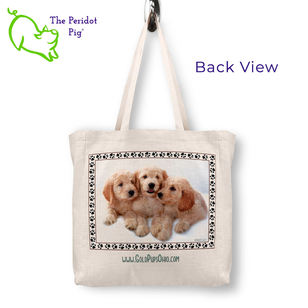 A spacious and trendy tote bag to help you carry around everything while showing off your adorable new puppy. These totes are very sturdy and feature a sublimated print that won't fade or peel over time. Printed in vibrant color with Gold Pups Ohio logo on the front and back sides. Back view shown.