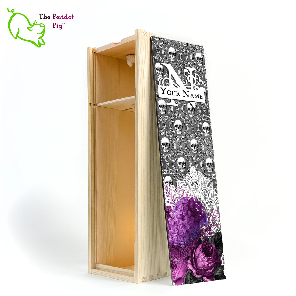 A gift wine box with decorated panel. The front panel is decorated in a glossy, detailed print with a monogram and space for a customized name. This model has a background of Victorian skulls with a bouquet of purple flowers and lace. Inside view shown in natural finish.