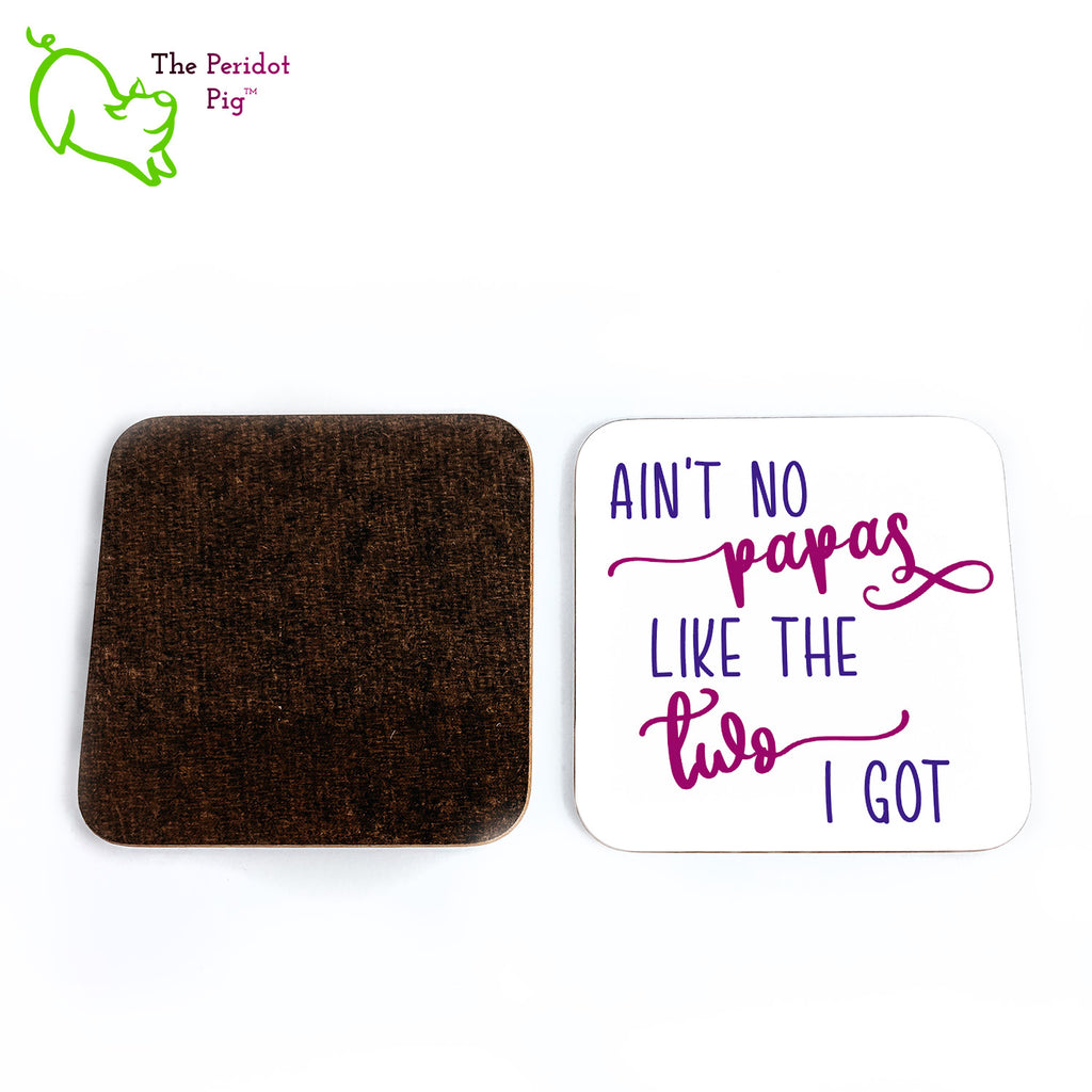So the grammar isn't the greatest but aren't these coasters cute? Show your pride for the wonderful dads you have! This set of four square coasters is printed in bright colors on either a matte or a gloss coaster. They simply state that "Ain't no papas like the two I got" in bright purple colors. Front and back shown.