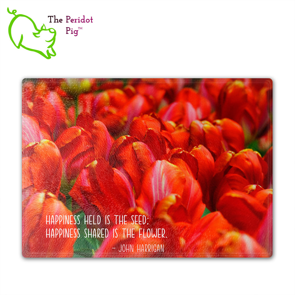 These beautiful tempered glass cutting boards are a wonderful keepsake!  They can be personalized with names, quotes or dates. This one features a field of bright red tulips in a vivid and detailed print. Perfect for cutting or using as a serving board! Front view with a sample quote.