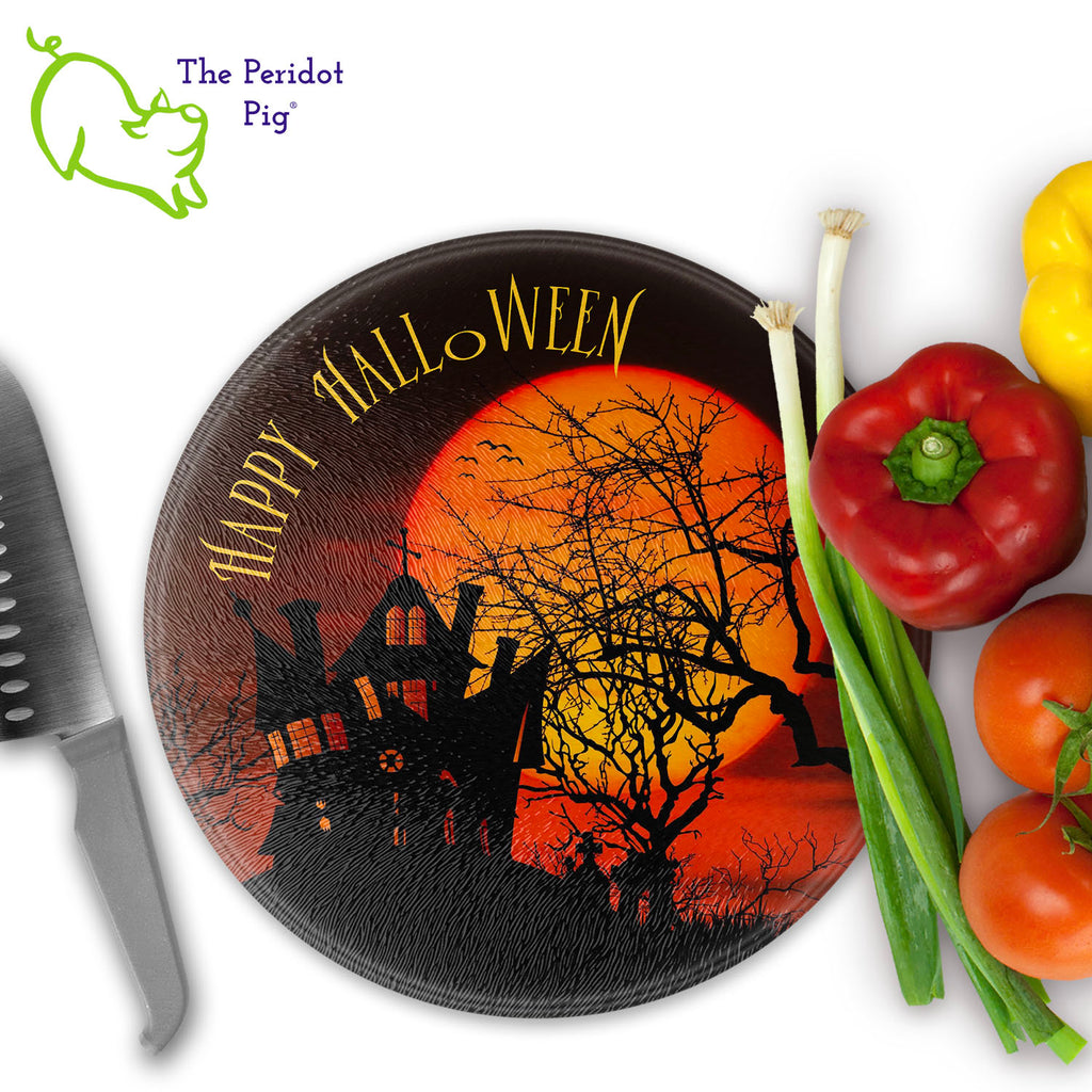 How about a Halloween cutting board for your next party? These make a perfect birthday, holiday or house warming gift! We've designed these with a dark graveyard scene. "Happy Halloween" is printed in a bright orange. They are printed in permanent sublimation colors that are vivid and bright. 12" round version shown with veggies.