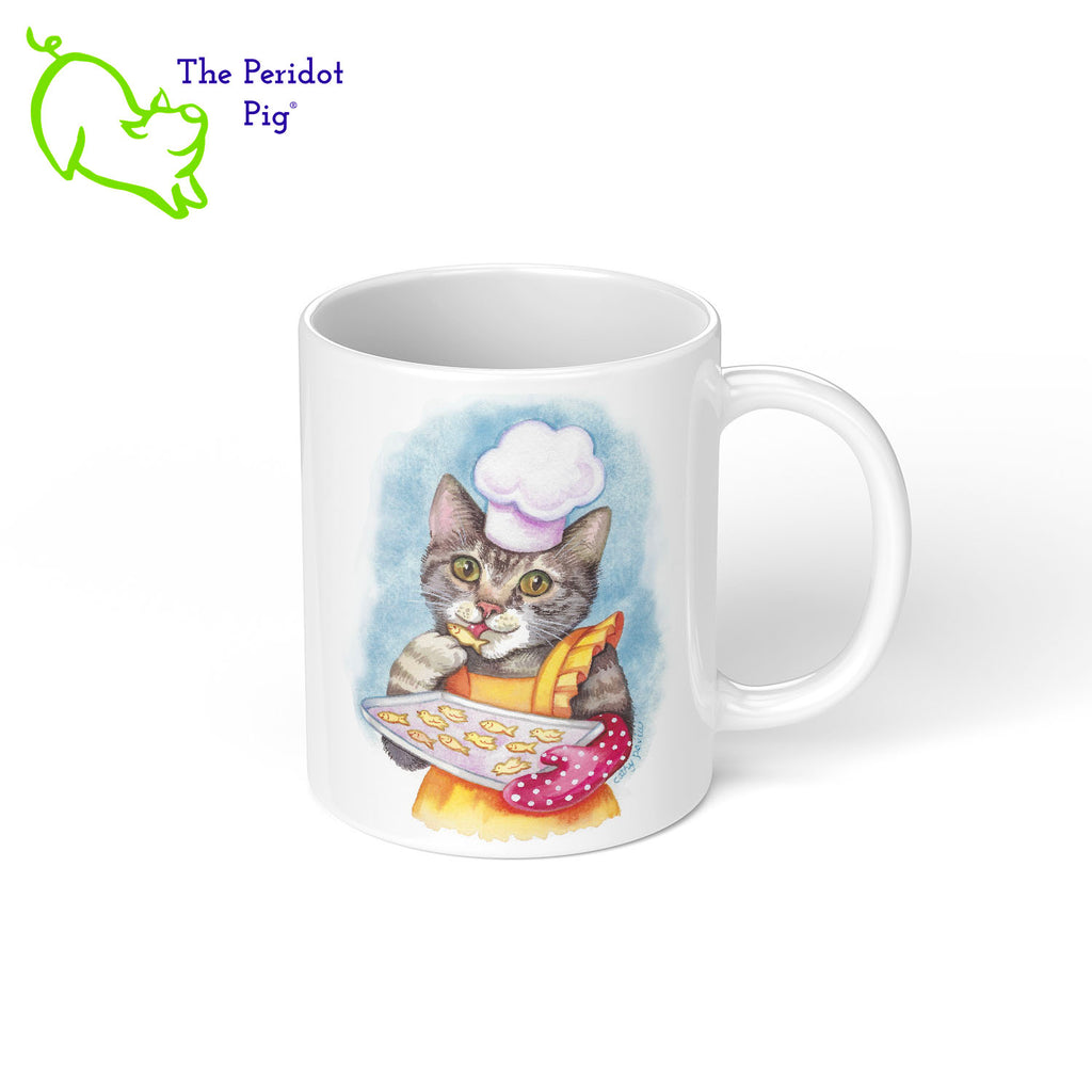 This 11 oz ceramic mug features the colorful artwork of Cathy Pavia and would be the perfect gift for a cat lover or chef. You have a cool cooking kitty on the front, baking some little kitty snacks. They're dressed in a bright apron, chef's hat and a polka dot oven mitt. On the back is the same image. Shown right view.