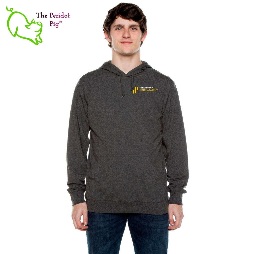 The Synchrony Financial Skills Academy Logo long sleeve t-shirt hoodie is a light-weight version of your classic pullover hoodie. The front features a small version of the logo on the left pocket area. The back has a larger version of the logo. Shown in charcoal, front view.