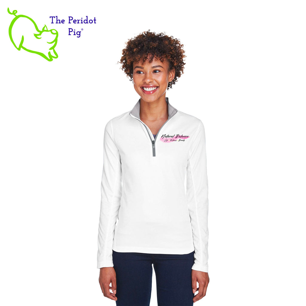 The Natural Balance Logo long sleeve quarter-zip is cut in a stylish modern fashion. The front features a small version of the logo on the left pocket area. The back is blank. Front view shown in white.