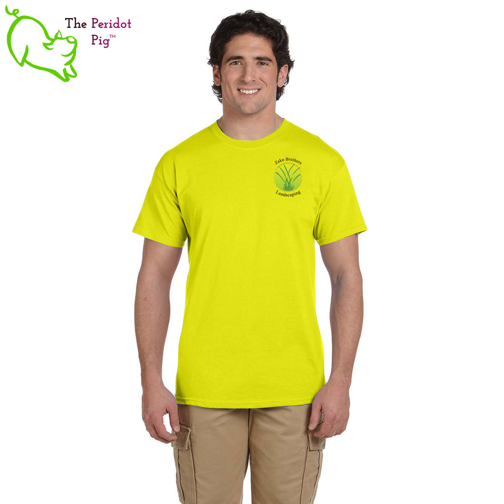 A saftey green short sleeve t-shirt featuring the Zako Brothers logo on the left shoulder area. A larger version of the logo is printed on the back. Front view.