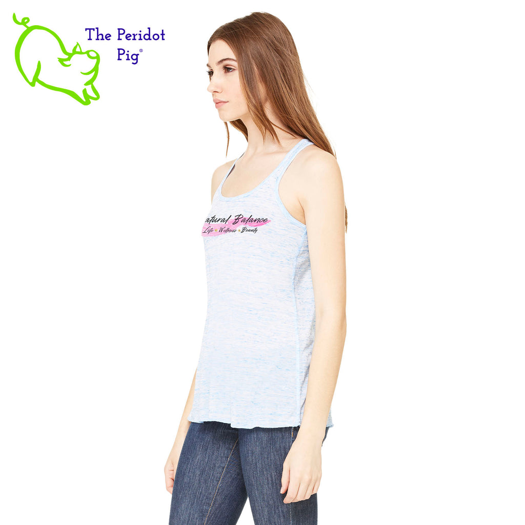 This racerback tank is super soft, lightweight, and form-fitting (but not too tight in the mid-section) with a flattering cut and raw edge seams for an edgy touch. The front features Coach Michele Smits' Natural Balance logo and the back is blank. Side view in blue marble.