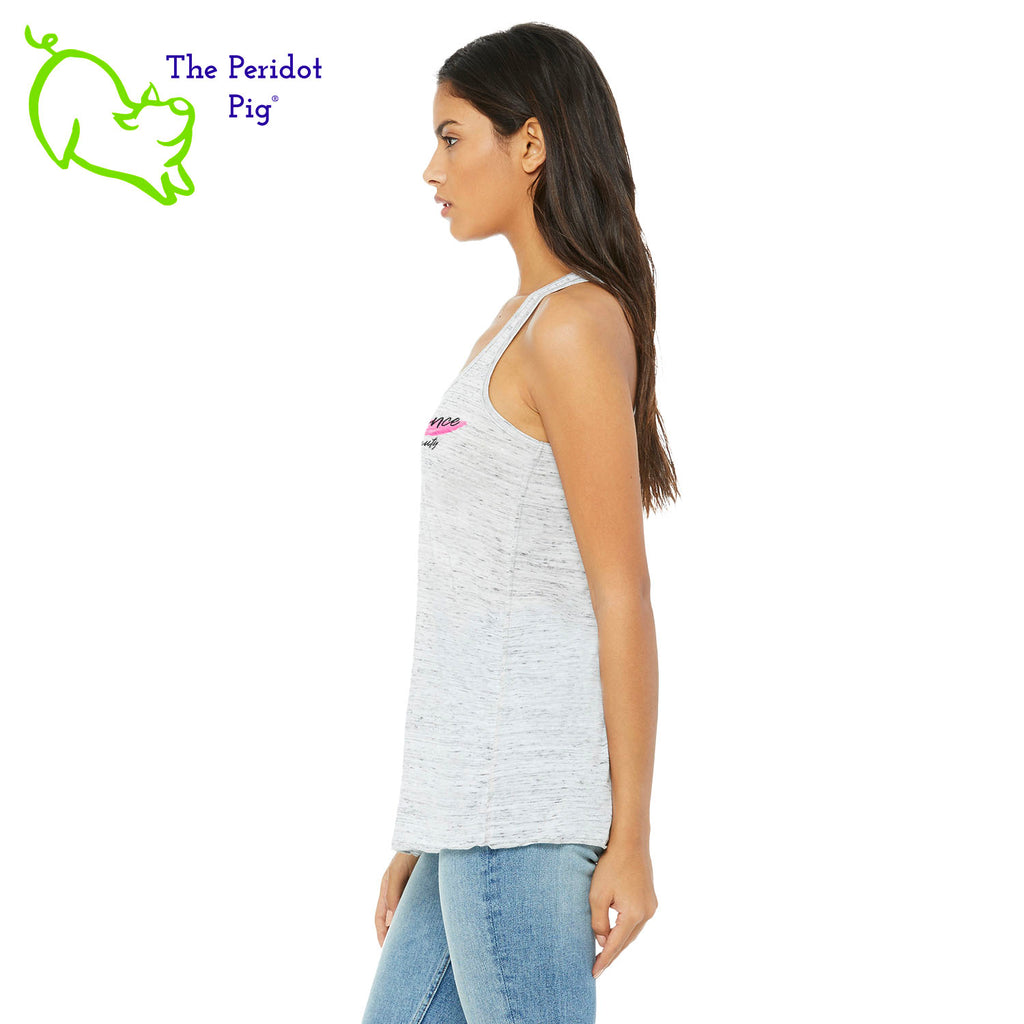 This racerback tank is super soft, lightweight, and form-fitting (but not too tight in the mid-section) with a flattering cut and raw edge seams for an edgy touch. The front features Coach Michele Smits' Natural Balance logo and the back is blank. Side view in white marble.