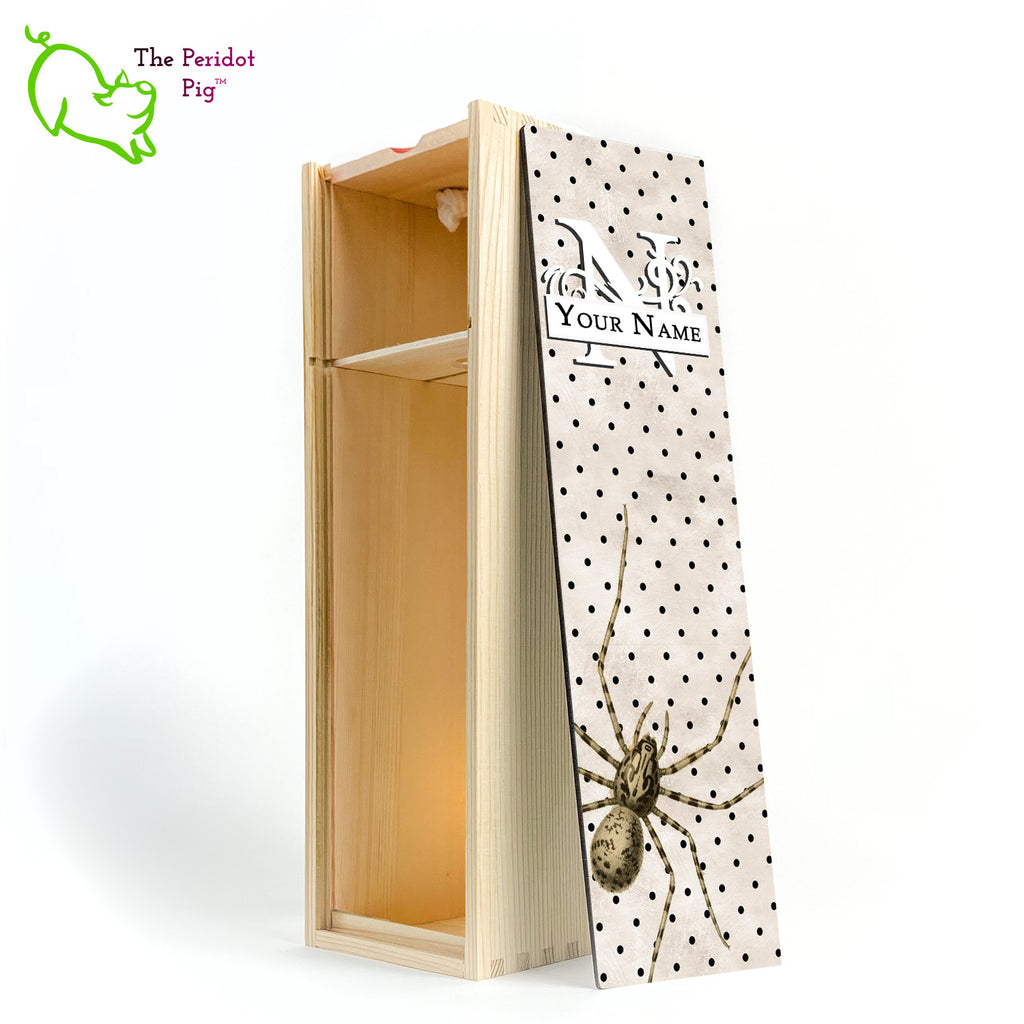 The wine box front panel is decorated in a glossy, detailed print with a white monogram and space for a customized name. This model has a mottled beige background with a pattern of black dots. In the foreground is a large drawing of huge spider. Not for the faint at heart! Natural version showing the interior.