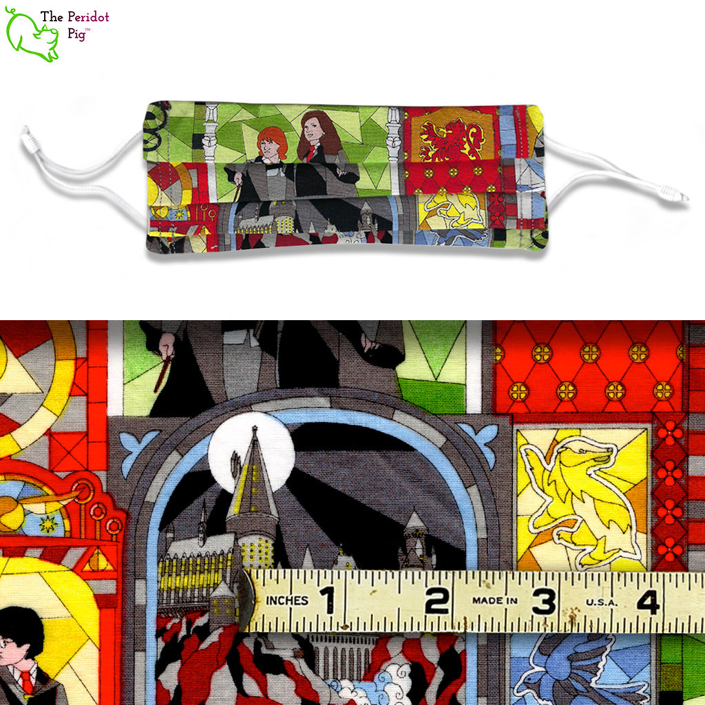 A colorful, stylized stained glass pattern featuring characters and emblems from the Harry Potter series. Called HP Stained Glass. A view of the mask and the fabric scale.