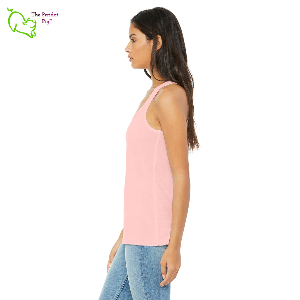 This racerback tank is super soft, lightweight, and form-fitting (but not too tight in the mid-section) with a flattering cut and raw edge seams for an edgy touch. The front features Kristin Zako's logo and the back is blank. Pink side view.