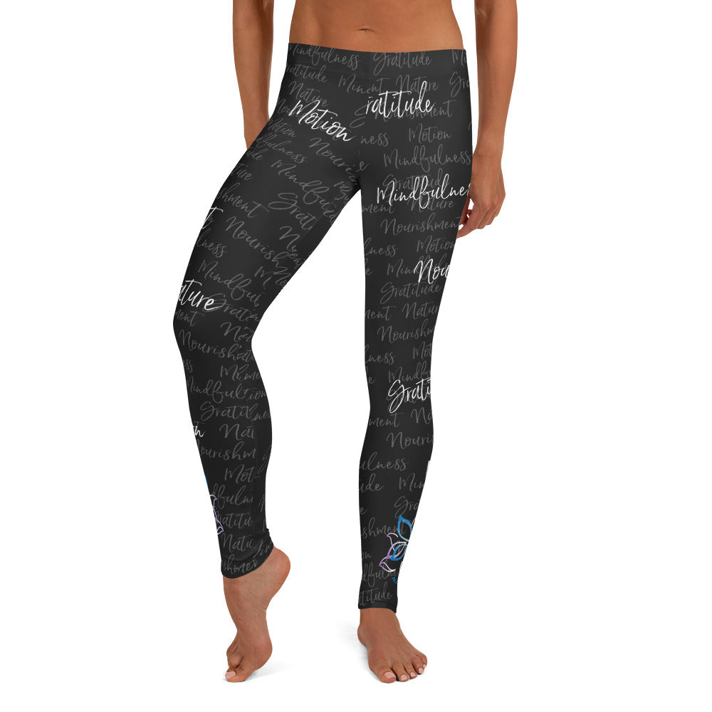 It's hard to compete with Kristin's dino leggings but these might do it! Filled with her four pillars phrases and topped off with her logo on each ankle. Shown in black, front view.