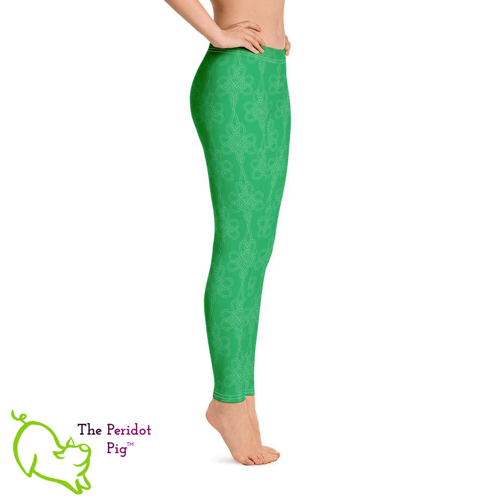 Avoid the pinching on St Patrick's Day with a pair of bright green leggings! These leggings feature a shamrock Celtic-style knot pattern set on a bright kelly green background. Right view.