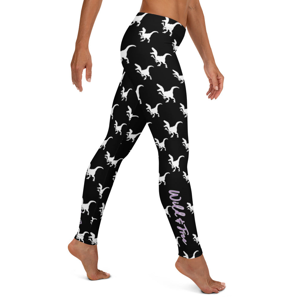 Kristin Zako embodies the "Wild & Free" spirit of her print leggings. These are extra special as they are printed in black and white color with a velociraptor silhouette.  The words, "WILD & FREE" are down the right leg and you'll find Kristin's logo on the lower left leg. Right view.