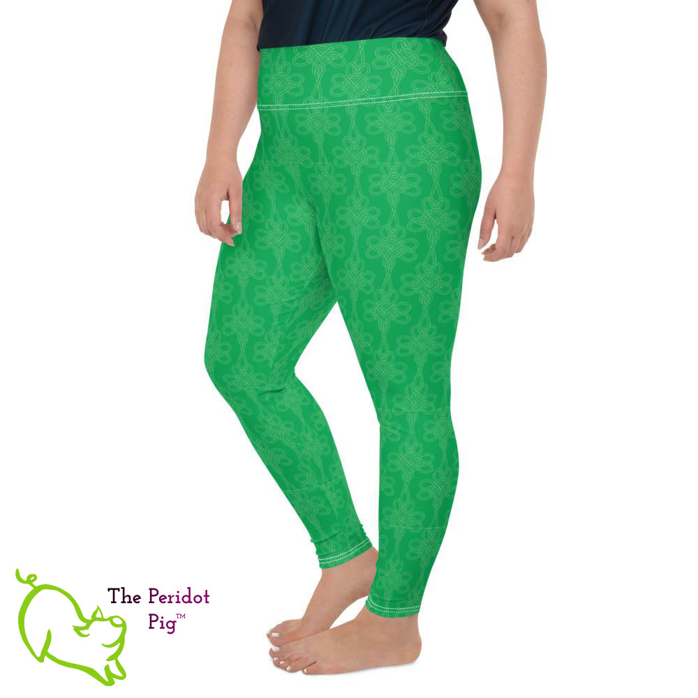Avoid the pinching on St Patrick's Day with a pair of bright green leggings! These leggings feature a shamrock Celtic-style knot pattern set on a bright kelly green background. Left side view.