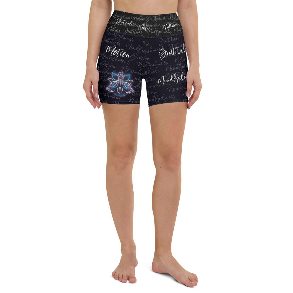 These yoga shorts have a body-flattering fit that will make you feel super comfortable even during the most intense workouts. They come with a high waistband and are made from soft microfiber yarn. The Kristin Zako print is filled with her four pillars phrases and topped off with her logo on the front right leg. Shown in black. Front view.