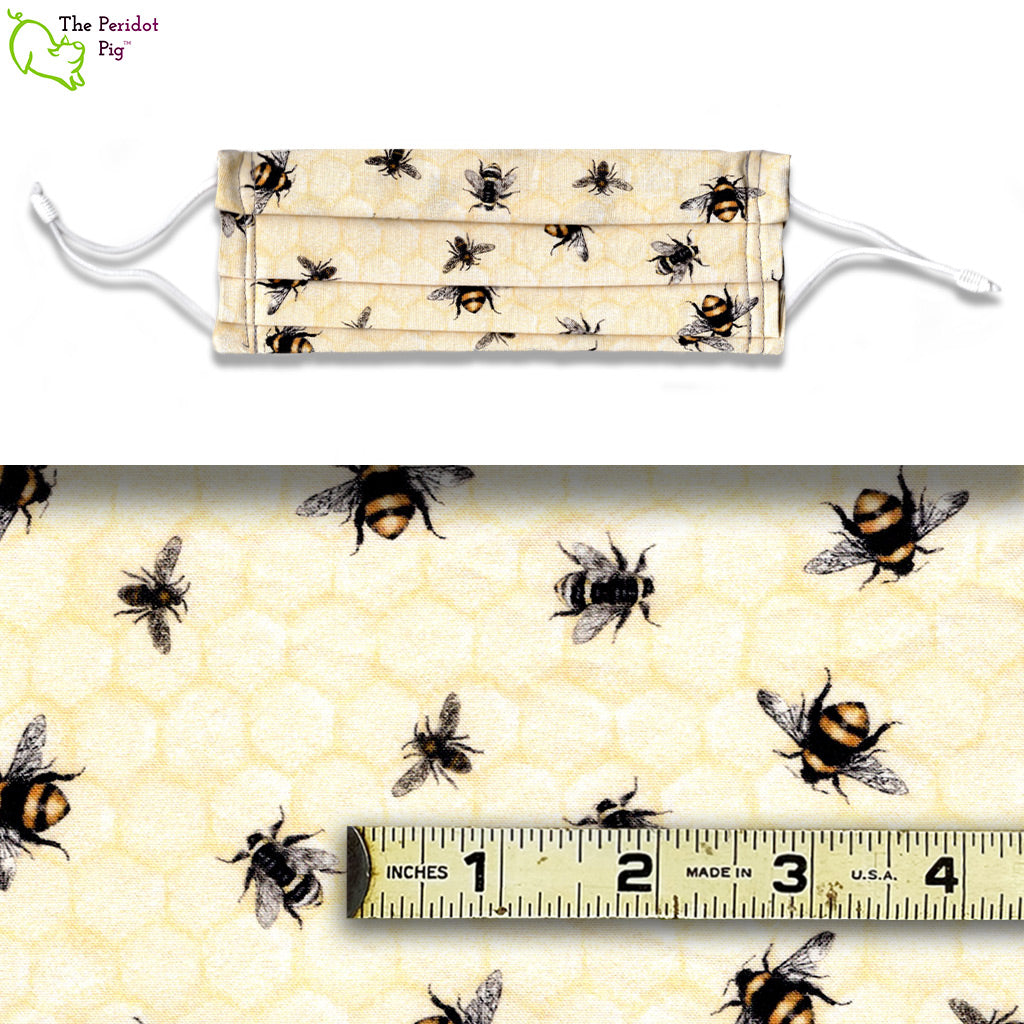 A selection of various bumble bees on a pale yellow, honey comb background. Called Bumble Bees.