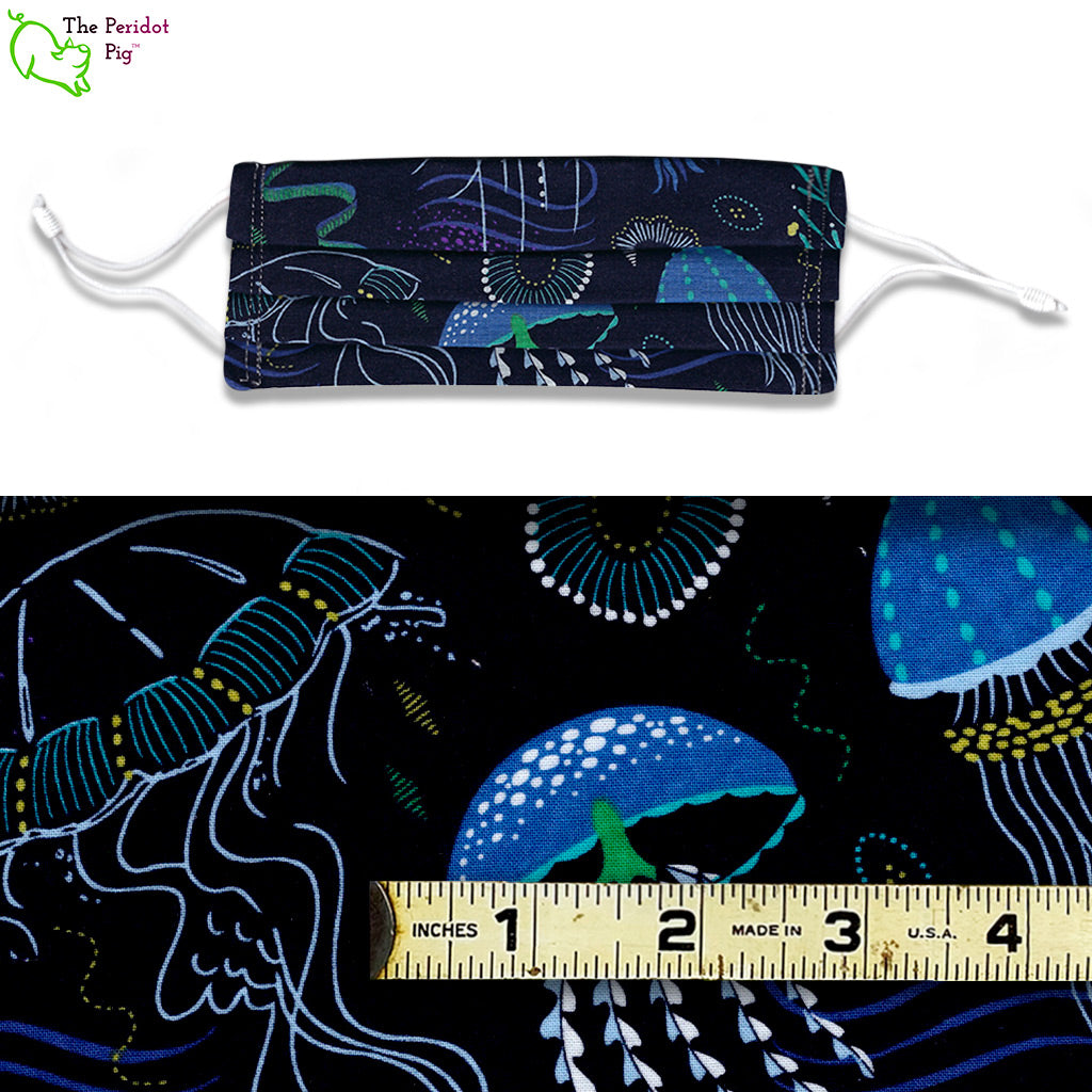This print has delicate jelly fish on a deep blue background. Av iew of the mask and the fabric scale.