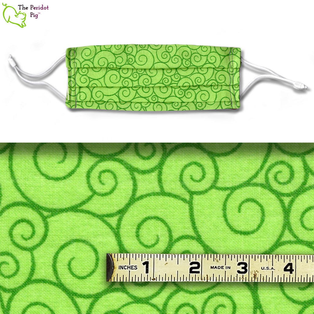 A split screen view of the Lime Swirl mask and a closeup of the fabric