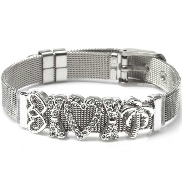 These mesh bracelets are cute enough to make "squeee" noises. They come with a variety of charms that come in different metal colors. There are hearts, rings, stars, ladybugs, unicorns and lots of glam! Stainless bracelet with silver charms.