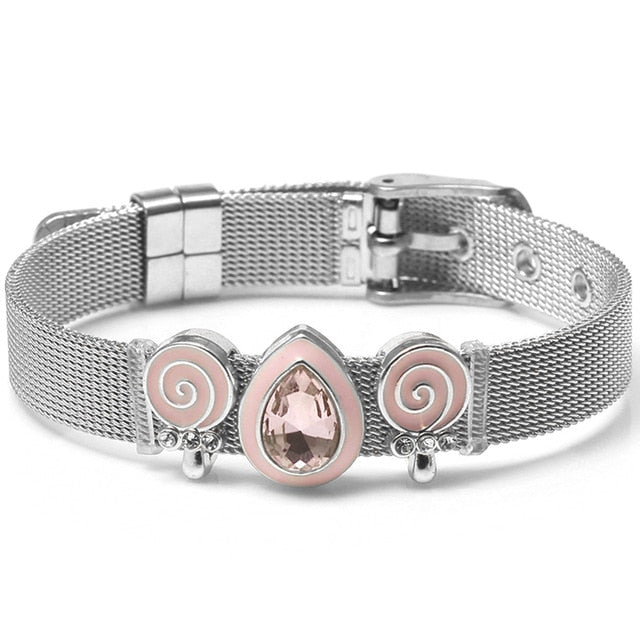 These mesh bracelets are cute enough to make "squeee" noises. They come with a variety of charms that come in different metal colors. There are hearts, rings, stars, ladybugs, unicorns and lots of glam! Stainless bracelet with pink and silver charms.